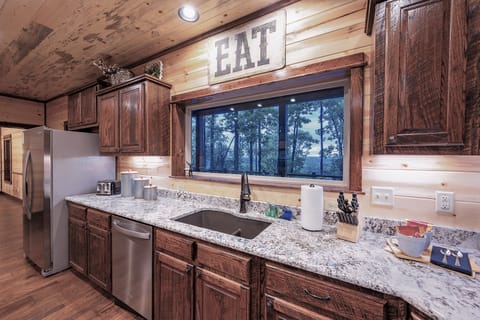 The kitchen features updated amenities and lots of counter space.