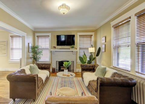 Spacious living room with a sofa and Netflix ready to be streamed!