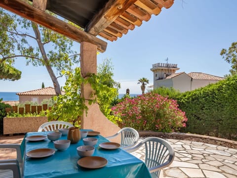 Plant, Sky, Table, Property, Furniture, Building, Chair, Outdoor Furniture, Tableware, Architecture