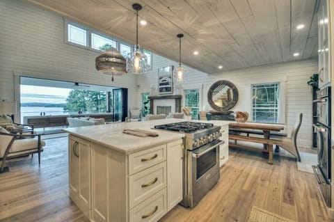 A spacious, open kitchen with stunning views makes cooking part of the vacation experience.