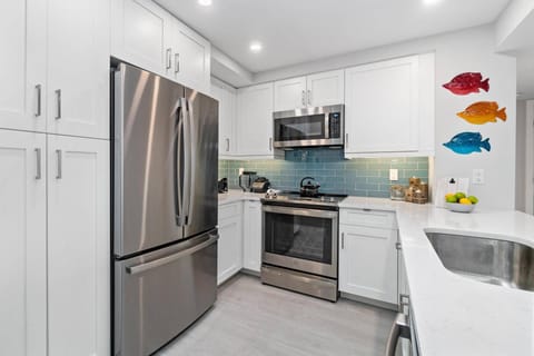 The fully-equipped kitchen includes all the necessary accoutrements, as well as lots of counter space for food & drink prep.