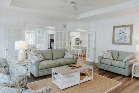 Den with a  pull out queen sized couch. Glass doors can be closed. 