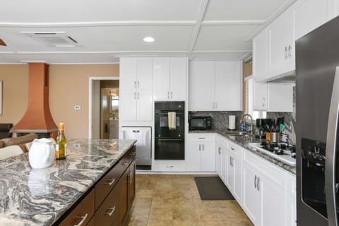 The kitchen is designed with functionality in mind and allows for space for the chef to create a great meal for everyone!
