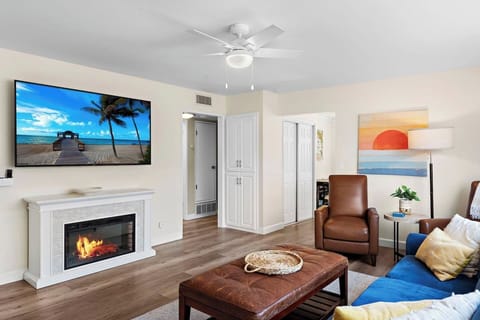 Just inside the front door is a spacious Living Room with lots of natural light and plenty of seating with a king-sized sofabed and two recliners.  It also offers a fireplace and large-screen TV.