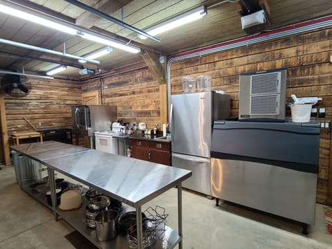 The communal kitchen is located on the 1st level of the Stables.