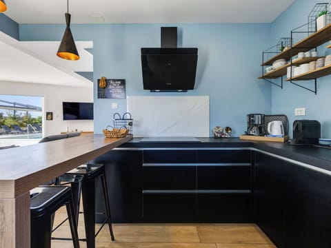 Interior Design, Furniture, Kitchen, Countertop, Kitchen Appliance, Cabinetry, Flooring, Lighting, Ceiling, Home Appliance