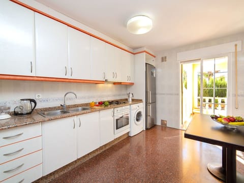 Room, Property, Furniture, Kitchen, Yellow, Countertop, Building, Real Estate, Cabinetry, Interior Design