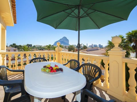 Table, Furniture, Property, Sky, Green, Chair, Plant, Nature, Umbrella, Building