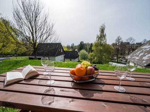 Sky, Plant, Table, Property, Furniture, Wood, Outdoor Furniture, Tree, House, Building