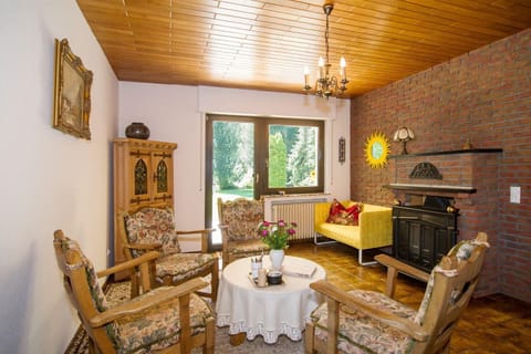 Living area. chimney room with chairs