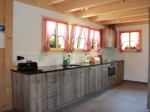 Countertop, Cabinetry, Property, Window, Kitchen, Building, Wood, Interior Design, Tap, House