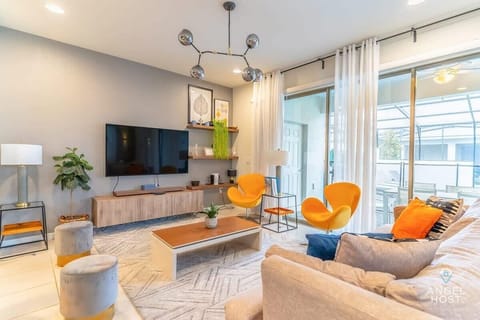 Gather in the stylish living room with plenty of natural light.
