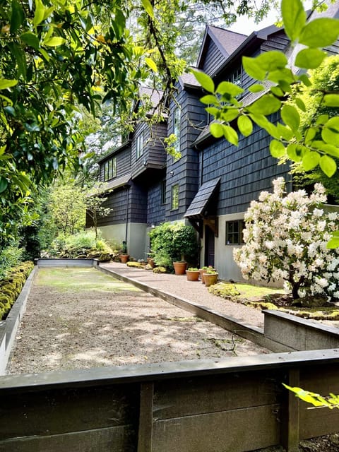 2 entries by bocce court, with climbing hydrangea make this feel European.
