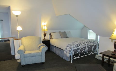 The Queen Size Bed Area in the Master Suite: the Entire Top Floor
