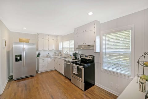 kitchen is large enough to have multiple cooks in this kitchen and well stocked to do the cooking
