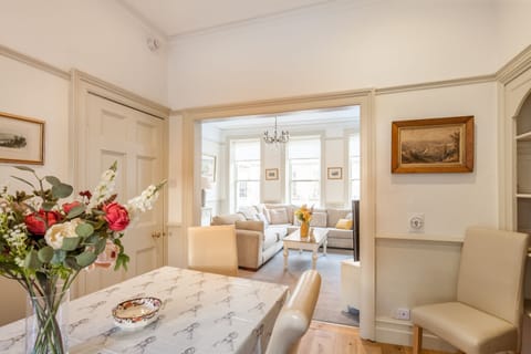 Dining table in-between kitchen and living room