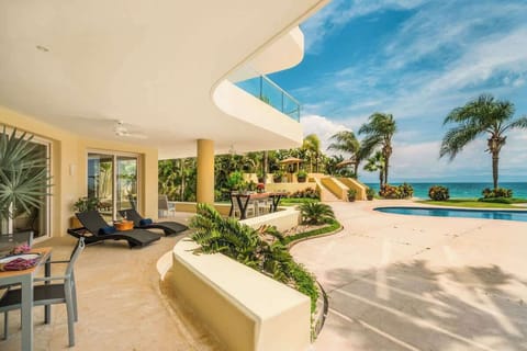 Relax on your private terrace overlooking the pool