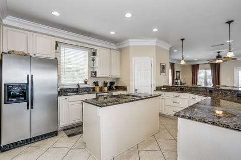 Kitchen with island stove top/oven
