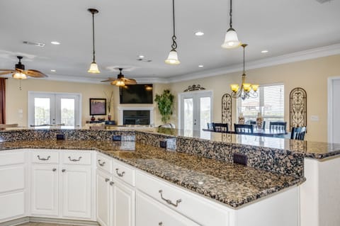 Kitchen with separate bar top and plenty of outlets
