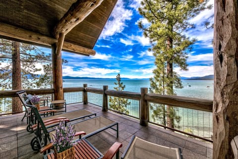 Your private deck overlooks pristine lake waters, where mountain views and gentle breezes create the perfect spot for morning coffee and peaceful evenings.