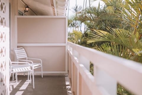 Sip morning coffee on a breezy balcony hideaway.