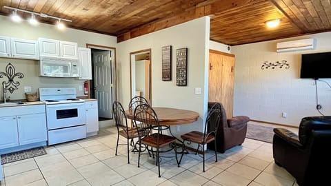 Living room, kitchen, and dining areas