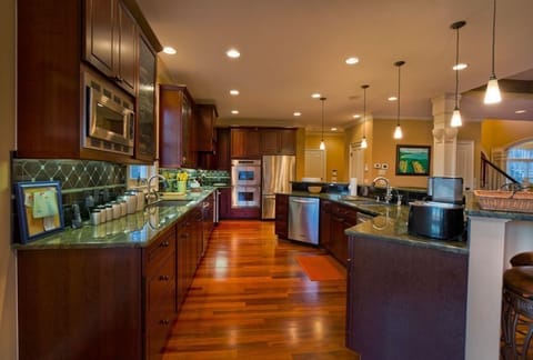 Gourmet kitch. 2 sinks 2 dishwashers, ice mach, wine frig, Gas c-top, dbl oven,