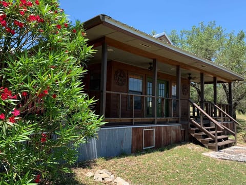 This sweet romantic cabin sits on ten beautiful acres, remote yet convenient to fascinating Hill Country towns.