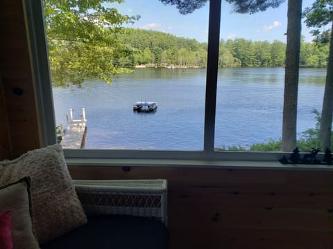 Looking at lake from screened in porch! Watching boats go by!