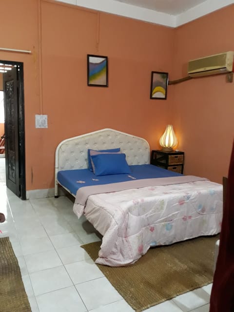 Large and privacy bedroom with air-conditioned and sofas .