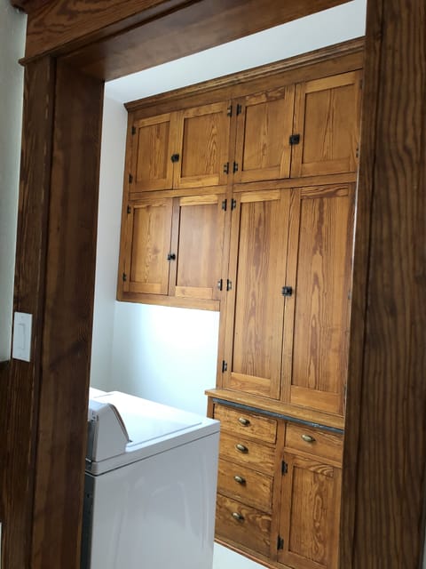 Pantry area with washer and dryer in main floor 