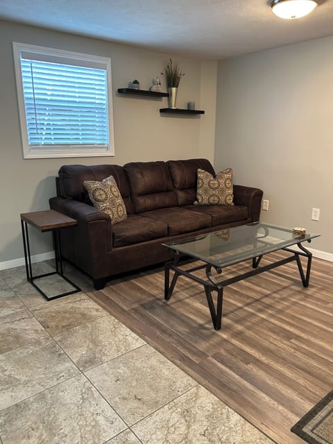 Living room area with queen sleeper sofa for additional guest