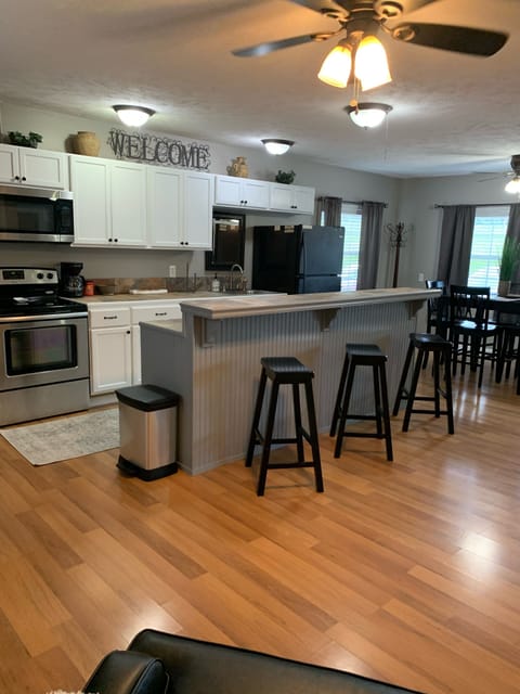 Open floor plan living/dining/eat-in kitchen 