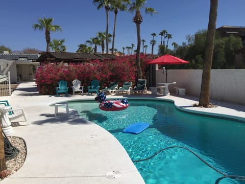 35000 gallon solar heated pool with diving board 12 ft deep end 2 hammocks 