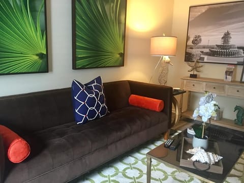 Mid-century meets coastal decorated livingroom with a 60" smart tv