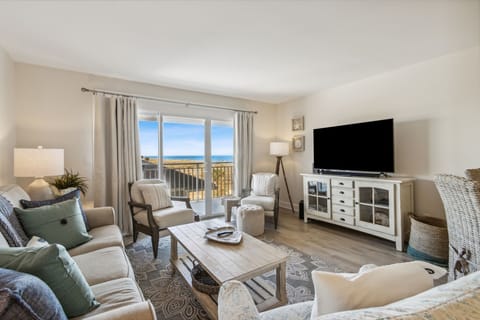 Bright and Open with Access to Private Balcony with Partial Ocean View