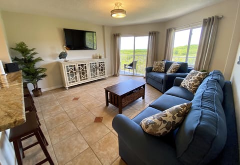Living Room - 4K TV, Xbox One S with Game Pass, board games and ocean view
