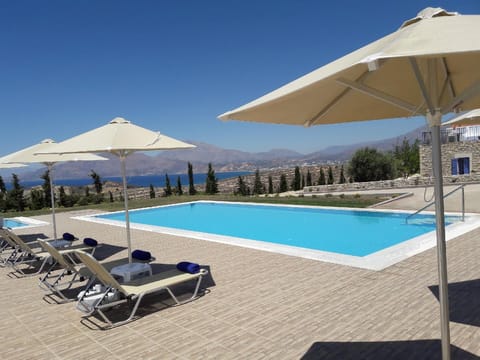 Pool. The 82sqm swimming pool with free umbrellas and sun beds