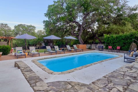 Lounge by the pool with your favorite beverage and soak this all in!