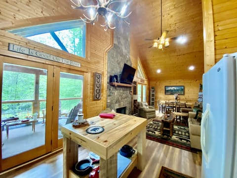 Kitchen view into living room and outdoor porch