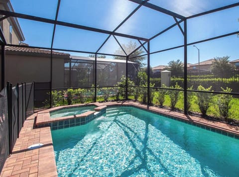 Screened-in private pool, perfect for sunny Florida days