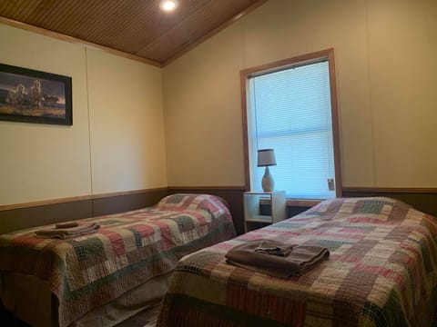 One bedroom includes 2 twin beds. 