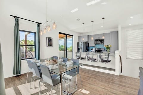 This inviting open concept dining area is the perfect space to enjoy a quality meal together.