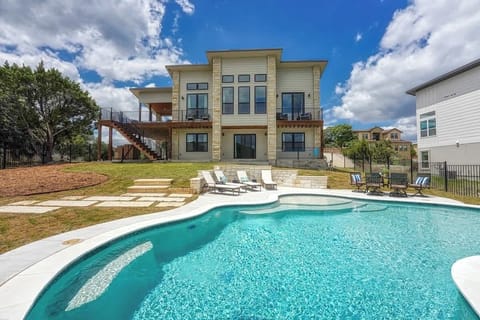 Cool off and relax in the crystal-clear waters of the private pool on a hot summer day.