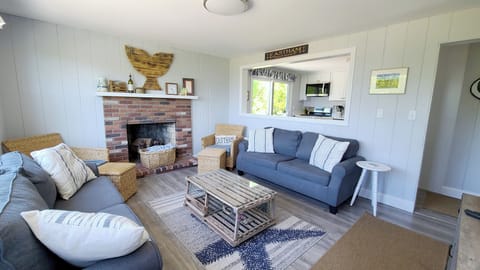Living room with comfortable seating and flat screen TV