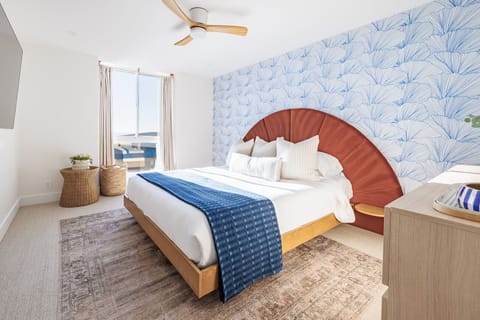 The primary bedroom features a  CAL-king sized bed