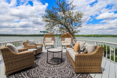 Spectacular lake views can be enjoyed inside and outside this home.