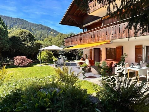 side view of the chalets exterior on a sunny day 