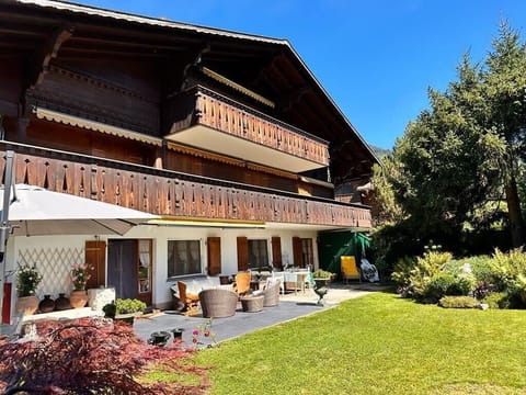 the stunning chalet from the garden 