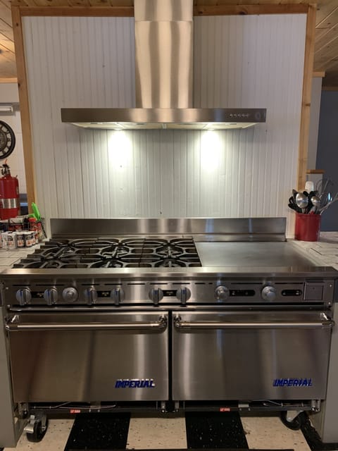 New commercial Imperial range. 6 burners, 2 ovens, and a flattop grill.